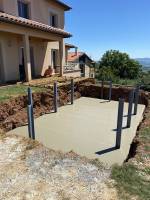 Entreprise spécialisé en maçonnerie dalle béton décoartifs et maçonnerie brute Saint Victor sur Rhins AV Chape liquide béton décoratif